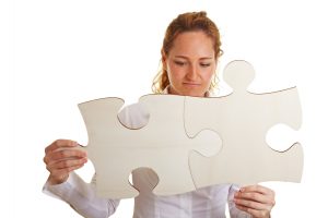 woman solving a puzzle